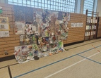 Bild der Turnhalle in der die Ausstellung der Kinderprodukte zum Kontinent Afrika zu sehen ist.